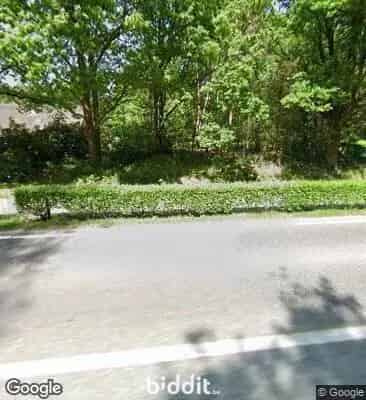 Perceel bouwgrond in groene omgeving