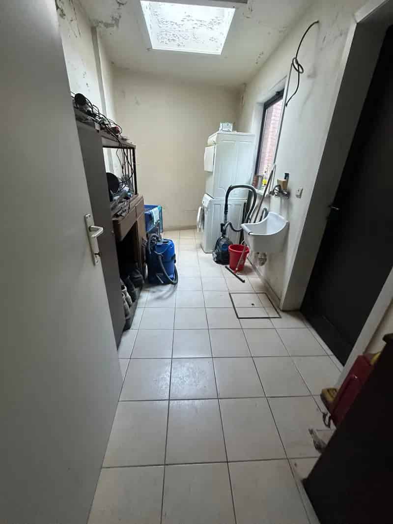 Te renoveren woning  in het hart van Zomergem