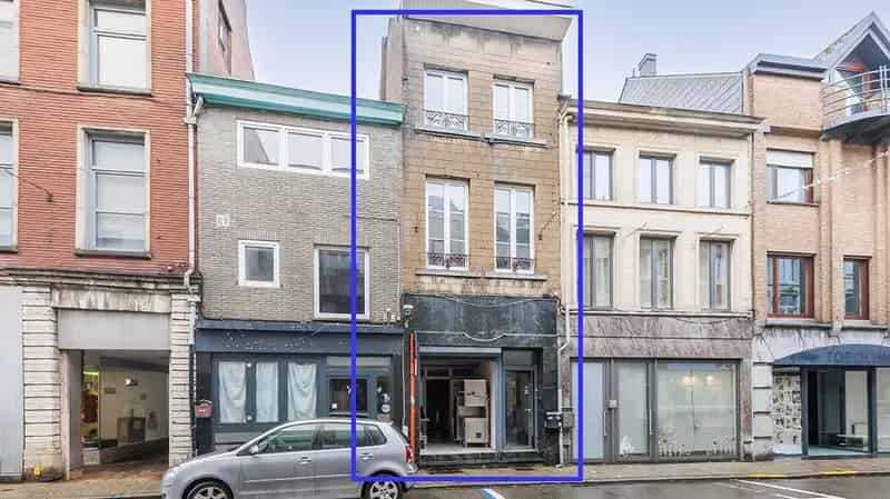 Handelszaak met duplex appartement in centrum Tienen