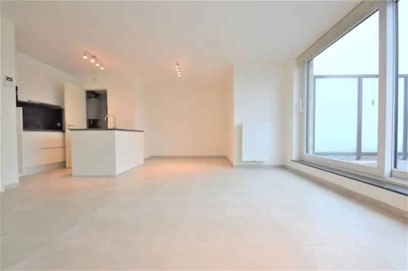 Appartement te huur Grembergen: Ruim nieuwbouw met terras en carport