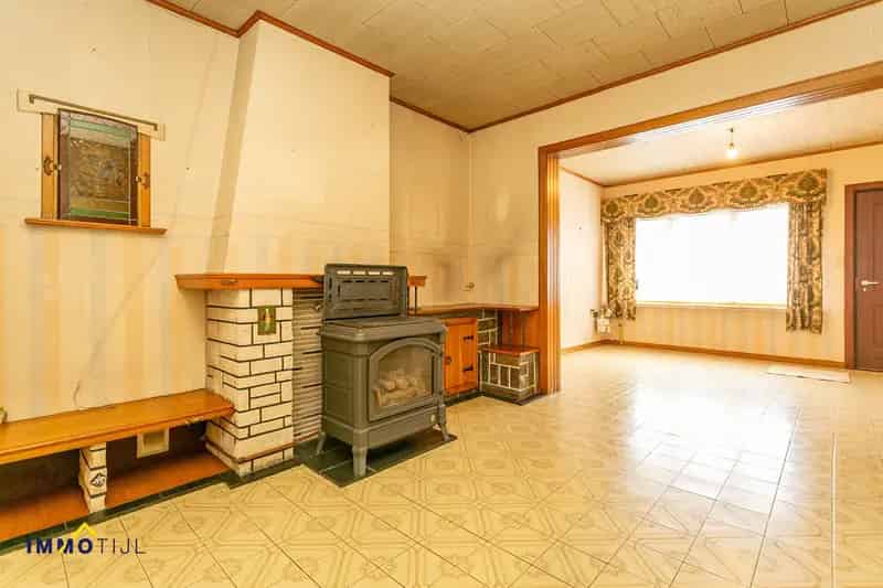 Te renoveren woning met tuin, centraal gelegen!