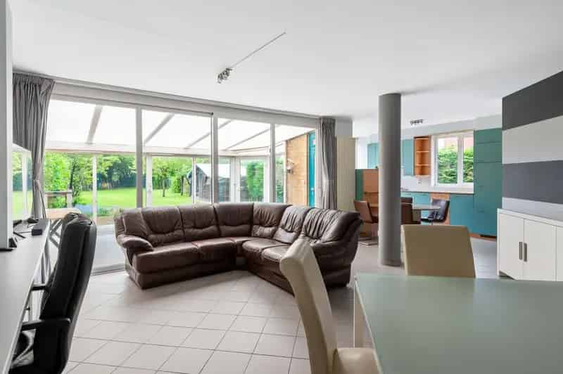 Ruime halfopen bebouwing met zuidwest georiënteerde tuin te Lint