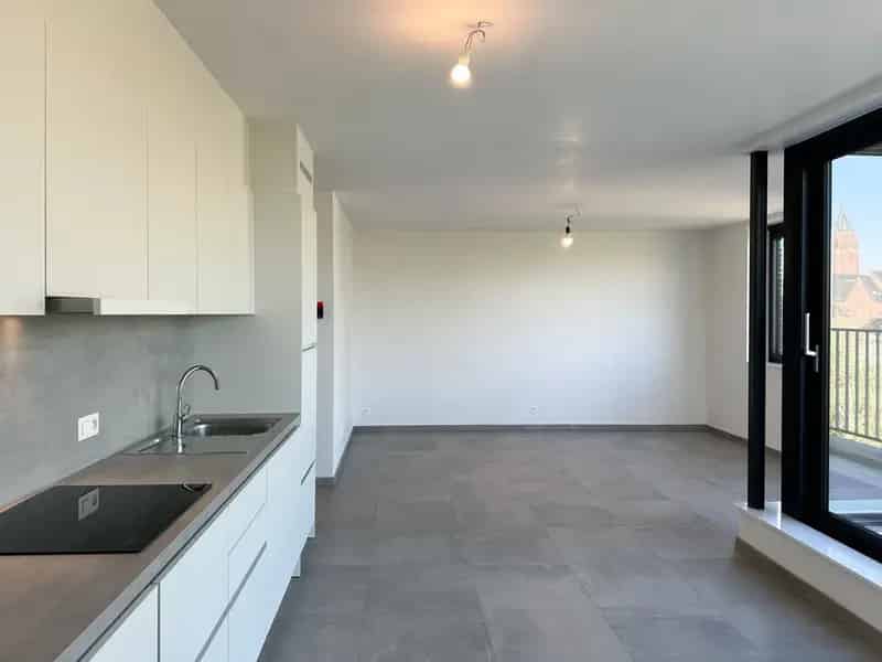 Knap app met 2 slpk, terras en staanplaats te Erembodegem!