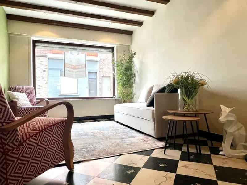 Charmante gezinswoning in hartje Harelbeke – een ideale starterswoning of slimme investering!