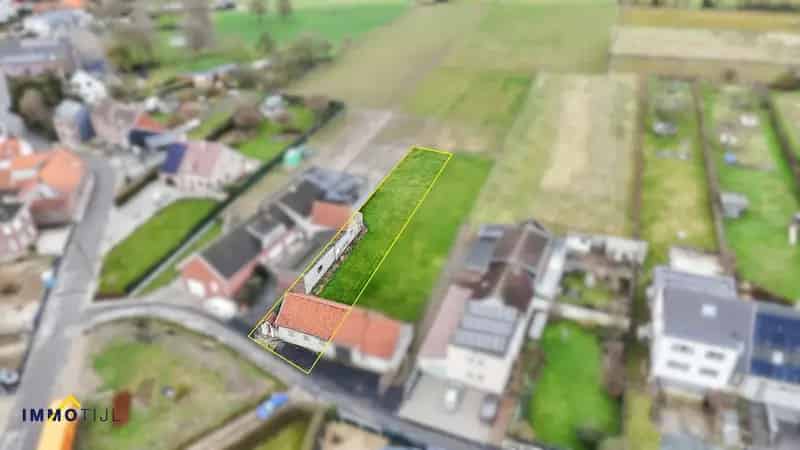 Ruim perceel grond voor halfopen woning te Meldert!