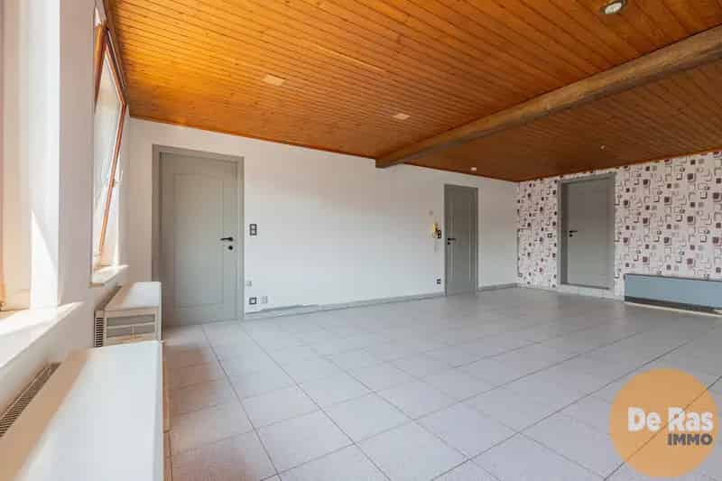 EREMBODEGEM - Woning met magazijn op centrumligging