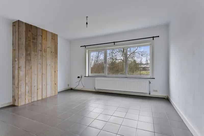 Opbrengsteigendom: 2 appartementen (2slpk, parking en tuin)