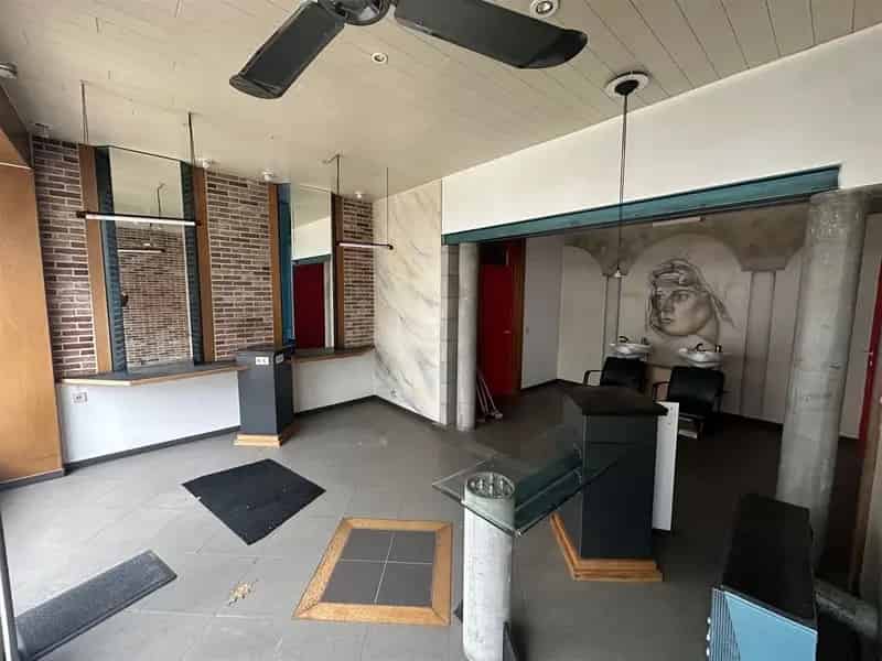 Centraal gelegen handelshuis met 2 slaapkamers