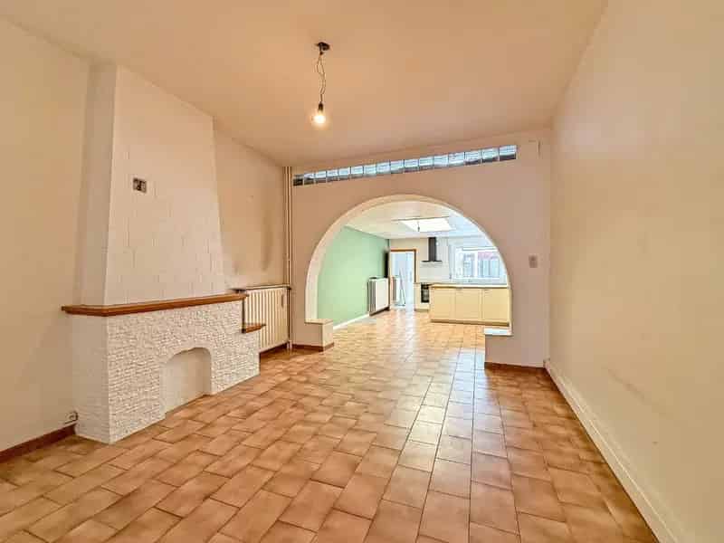 Instapklare rijwoning met garage en zonnige tuin nabij marktplein (157 m²)