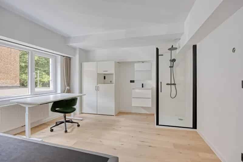 Volledig gerenoveerde studentenkamer in residentie met 29 studentenkamers in hartje Leuven - EPC label A!