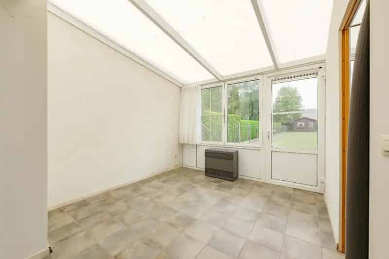 GOED ONDERHOUDEN RIJWONING MET 3 SLPKS, TUIN & GARAGE