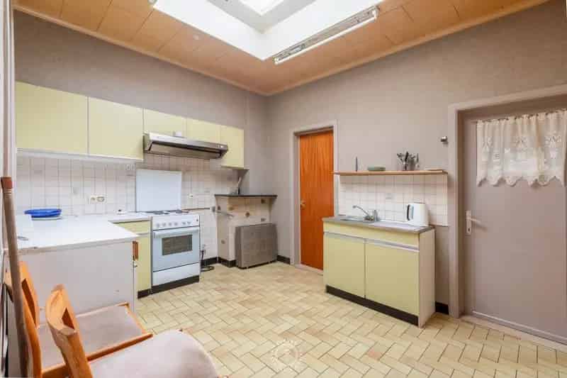 Betaalbare stadswoning met tuin en potentieel – ideaal renovatieproject