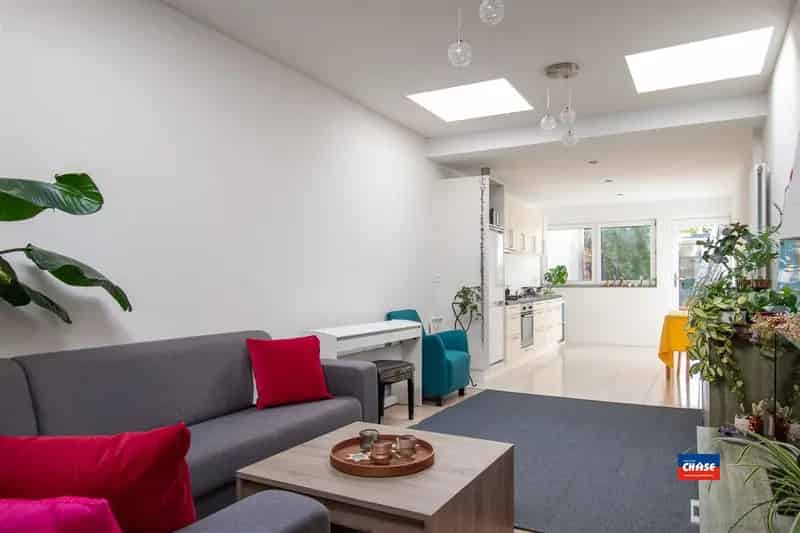 Rijwoning met 2 à 3 slaapkamers en tuin