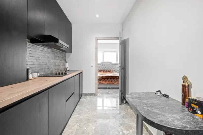 Ruime woning met studio, terras en tuin te koop in Wommelgem!
