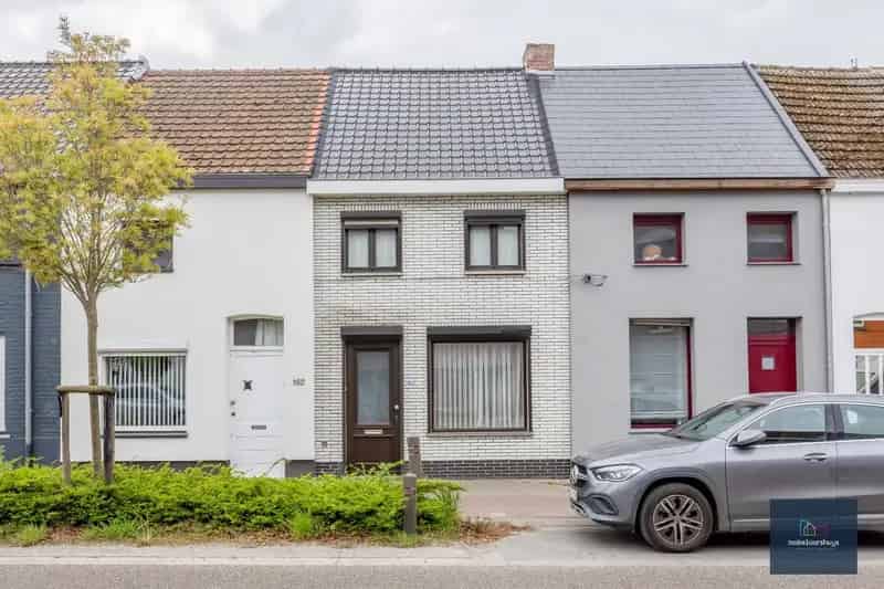Rijwoning met tuin te Wetteren.