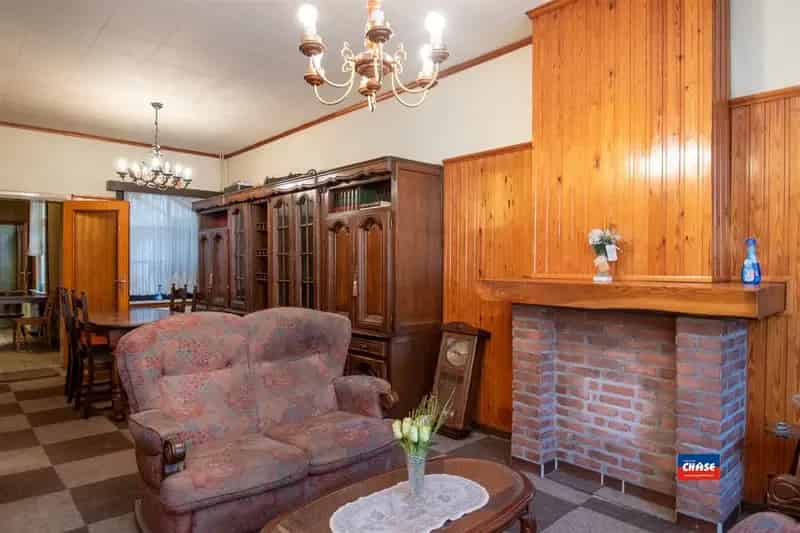 Rijwoning met 4/5 slaapkamers en tuin