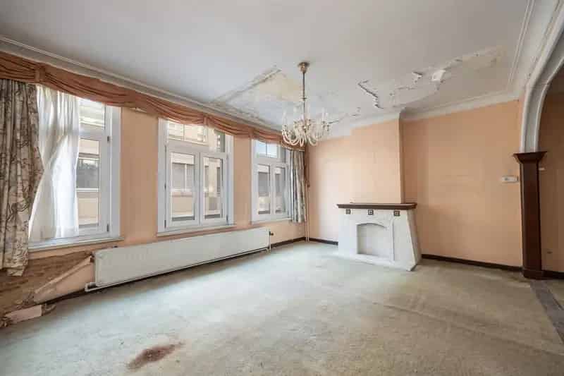 Woning met gigantisch magazijn te renoveren