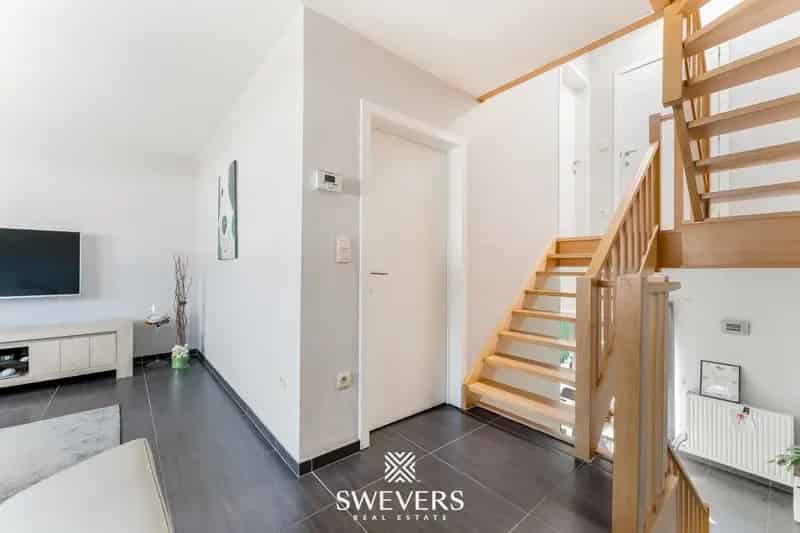 Instapklare en energiezuinige rijwoning met 3 slaapkamers en leuke tuin op TOPlocatie in Koersel
