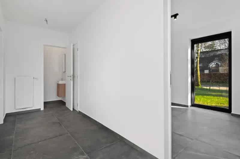 Halfopen nieuwbouwwoning met 4 à 5 SLPKS en grote tuin in Kapellen!