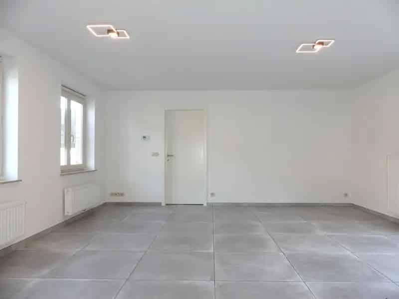 Halfopen nieuwbouwwoning met binnenterras, tuintje en garage - 3 slaapkamers