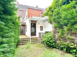 Huis te Koop Ronse - Op te frissen Rijwoning met Tuin