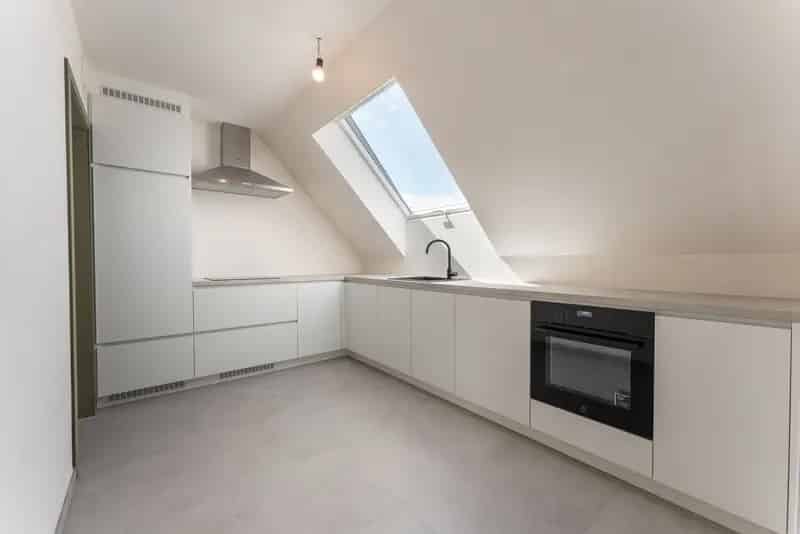 Energiezuinig duplex appartement met zonnig terras en autostaanplaats te Lebbeke.