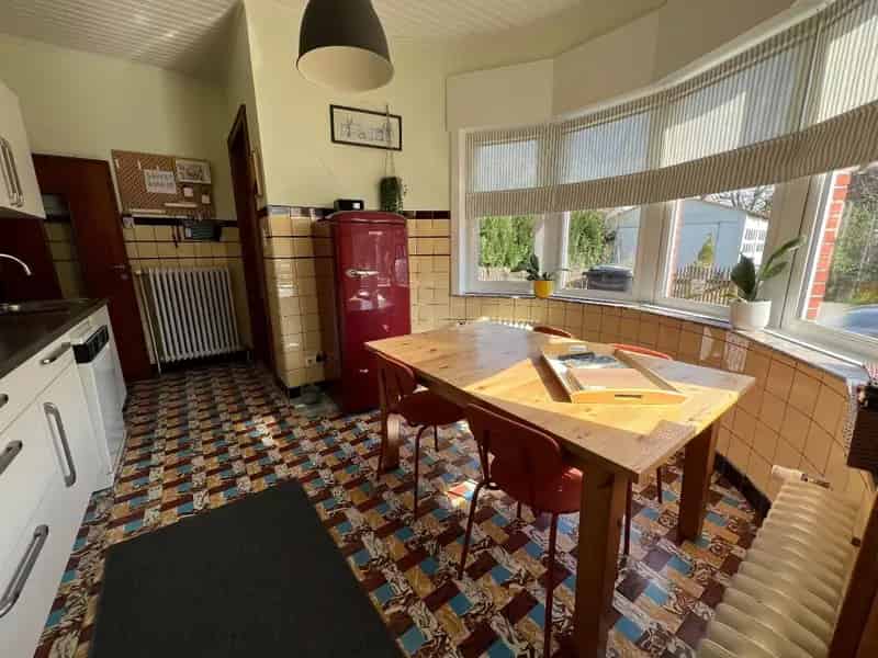 Karaktervolle halfopen woning met 3 slpks, garage, tuin en terras
