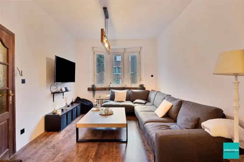 Woning nabij Wemmel centrum met gezellige koer