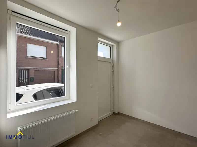 Instapklare woning met 3 slk en zonnige tuin te Erembodegem!