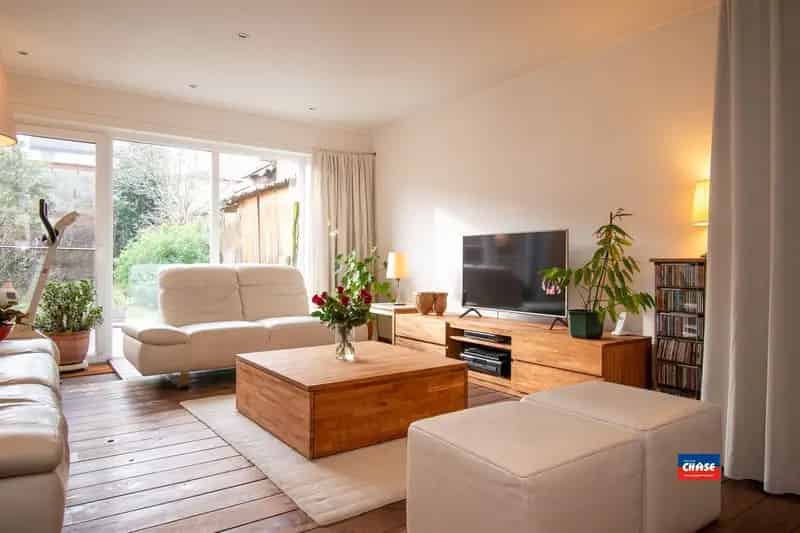 Rijwoning met drie slaapkamers en tuin
