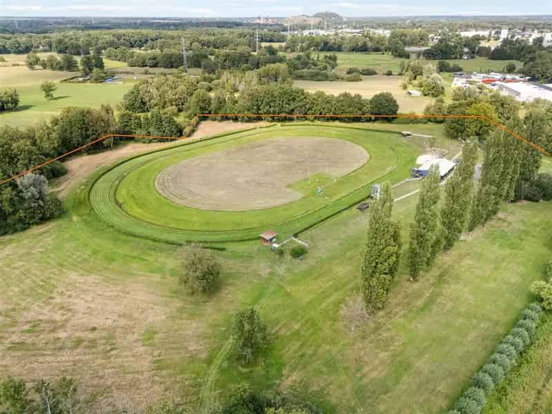 PERCEEL VAN CIRCA 6 HECTARE LANDSCHAPPELIJK WAARDEVOL AGRARISCH GEBIED TE PAAL