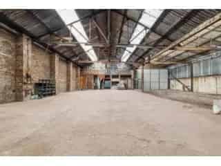 Huis te koop Hoeselt - Renovatieproject met grote loods