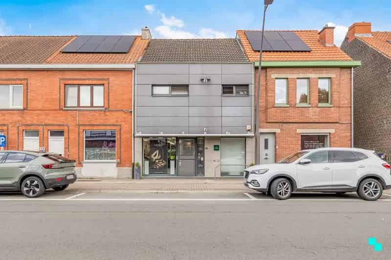 Handelspand met woning in het hart van Merelbeke