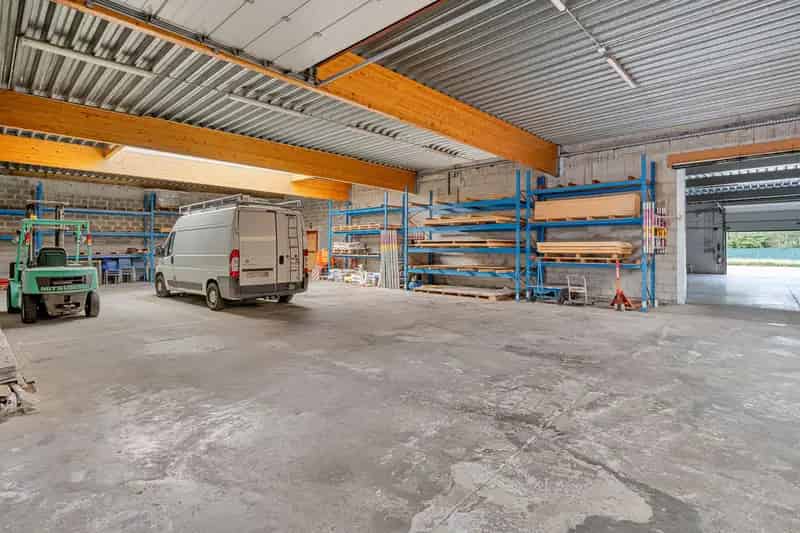Project op 4320 m2 met woning, loods + bouwgrond