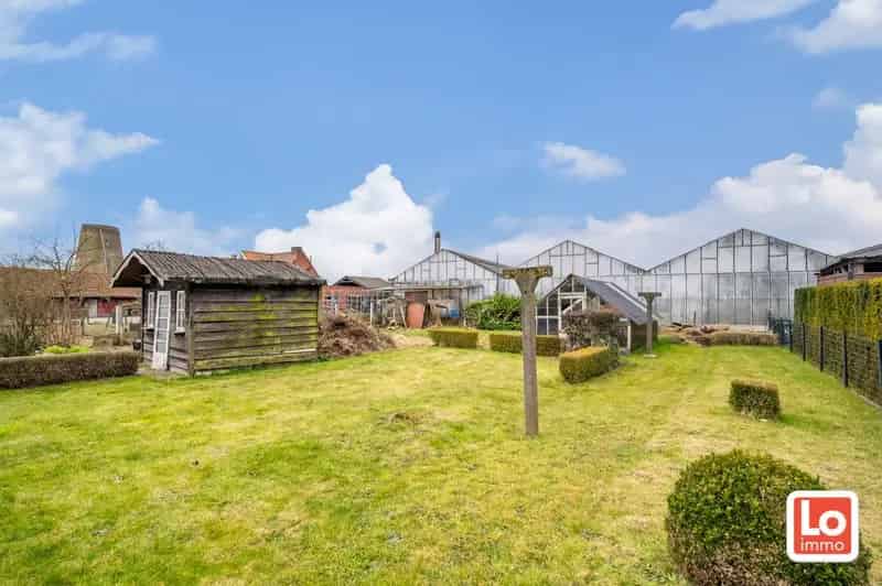 Charmante open te renoveren woning met garage en grote tuin op een goed bereikbare locatie tussen Lochristi en Oostakker!