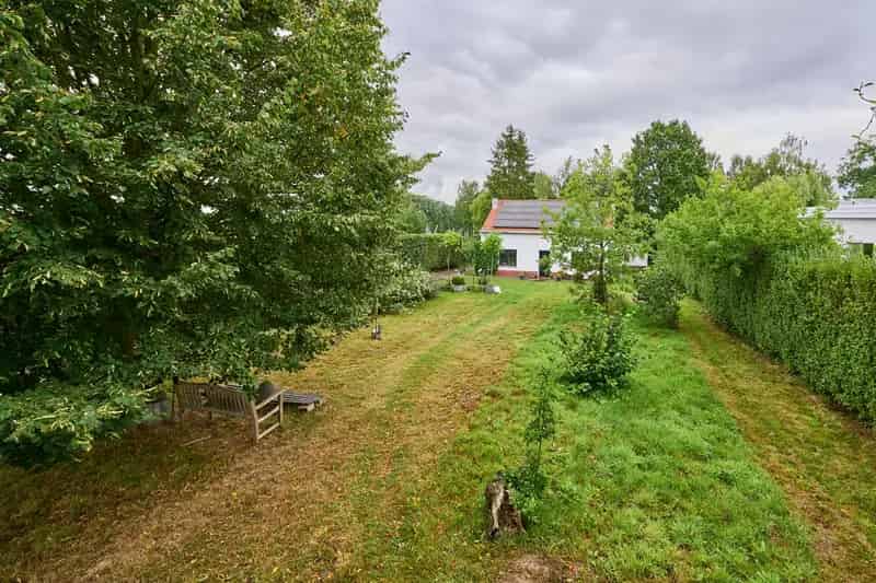 Prachtig gelegen bouwgrond met bestaande woning in het groen