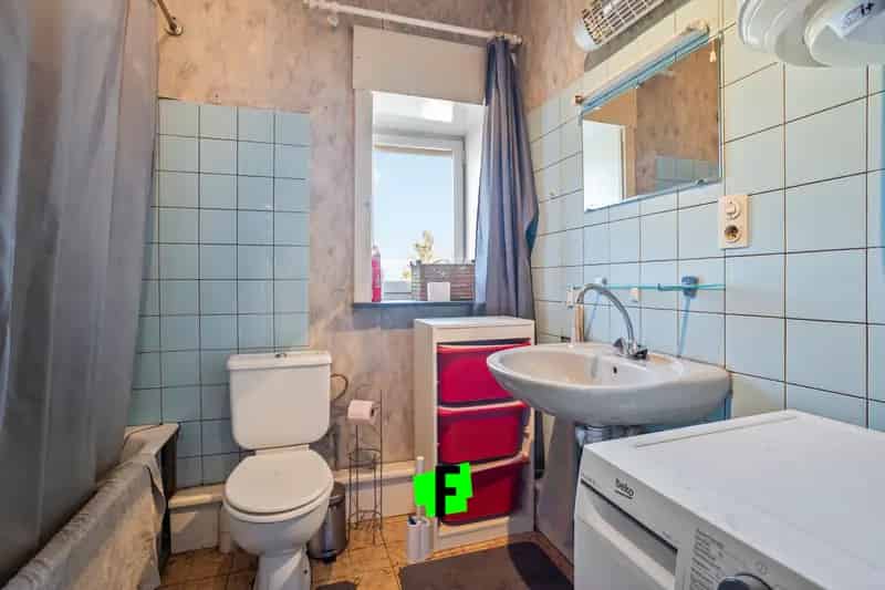 Te renoveren woning met uitweg in Poperinge