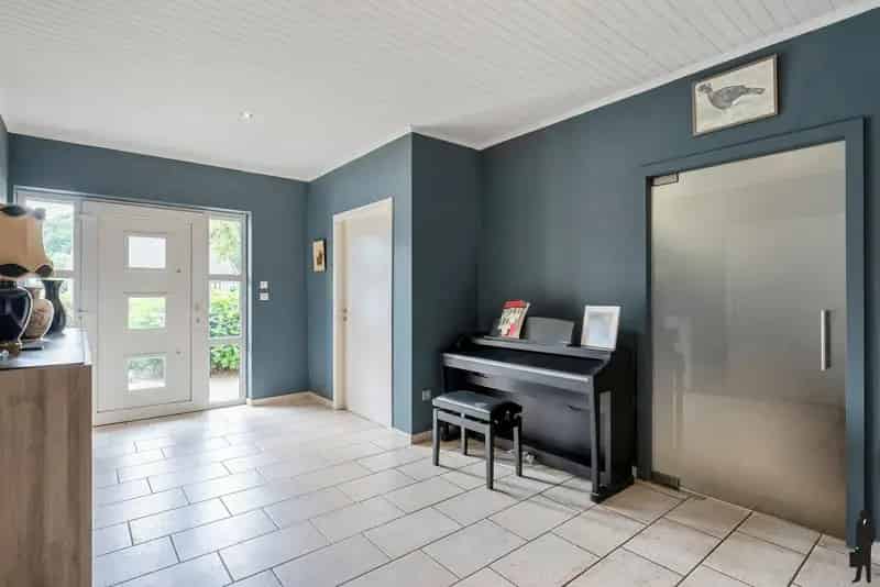 Woning met 4 slpk, inpandige garage en werkhuis in Kasterlee