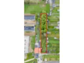 Bouwgrond 1042m² Lebbeke - Halfopen Bebouwing - Nabij Station