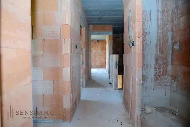 Halfopen nieuwbouwwoning met 3 slaapkamers in verkaveling ’t Sand – energiezuinig en modern