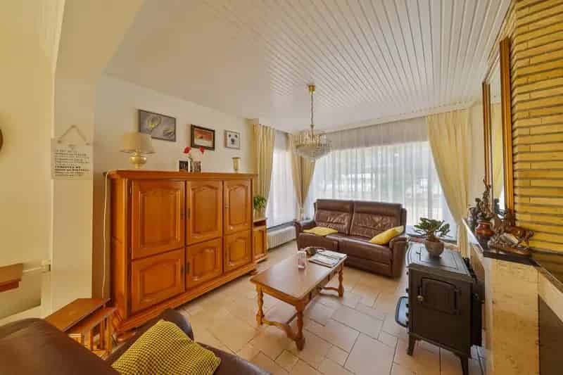 Halfopen woning met garage en zonnig terras te Mariakerke