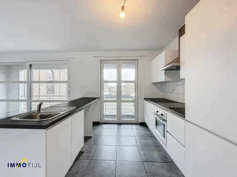 Veelzijdig appartementsgebouw in hartje Herdersem!