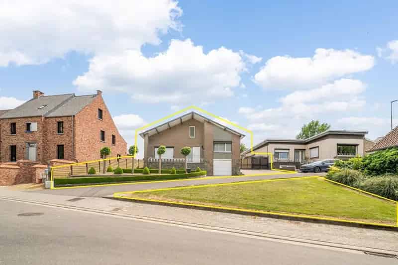 IN OPTIE - Verzorgde vrijstaande woning met mooie tuin op 11a 58ca, op enkele minuutjes van het centrum