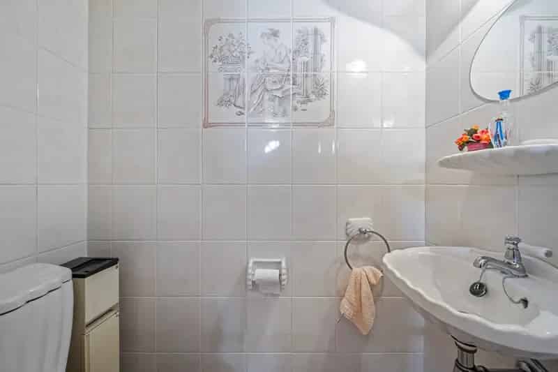 Rijwoning met potentieel, zonnige tuin, garage en uitbreidingsmogelijkheden te koop in Ruddervoorde