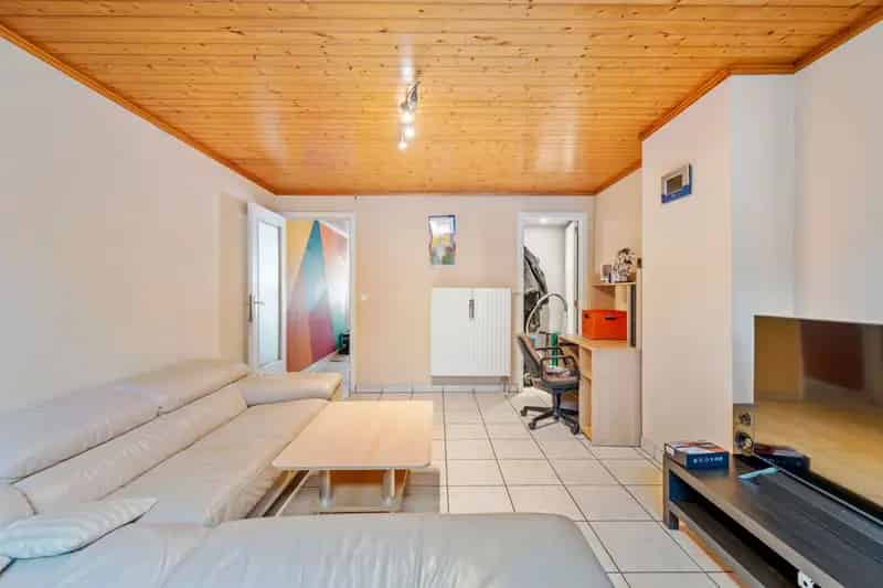 Charmante rijwoning met koer op geliefde locatie