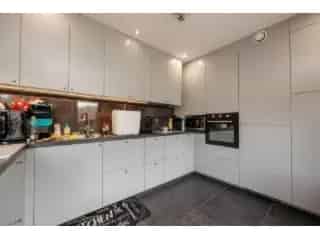 Appartementen te koop Beerse - Opbrengsteigendom 5 appartementen en handelspand