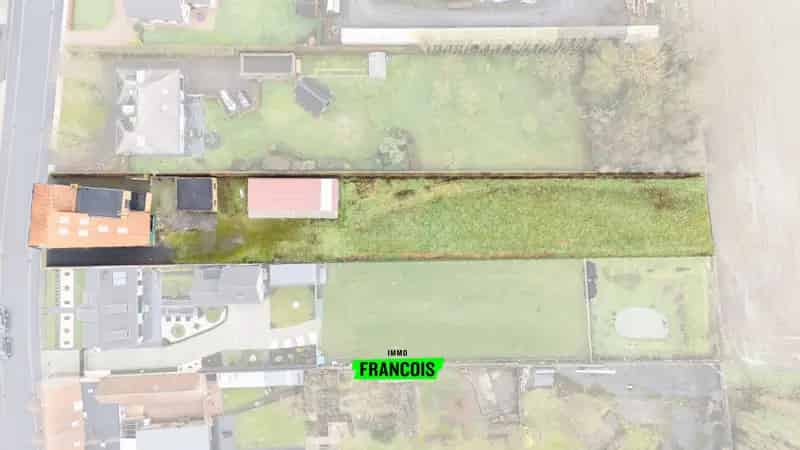 Unieke eigendom met woonst, opslagruimte en grond te Knesselare