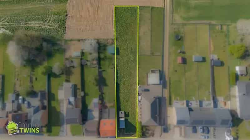 Bouwgrond halfopen bebouwing met weids groenzicht te Ninove