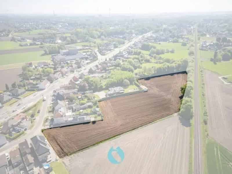 Zuid georiënteerd perceel bouwland van 5.506 m² te Evergem