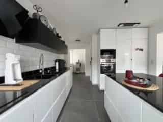 Appartement te Koop Baelen - 2 slaapkamers - Dubbele Garage - Gerenoveerd